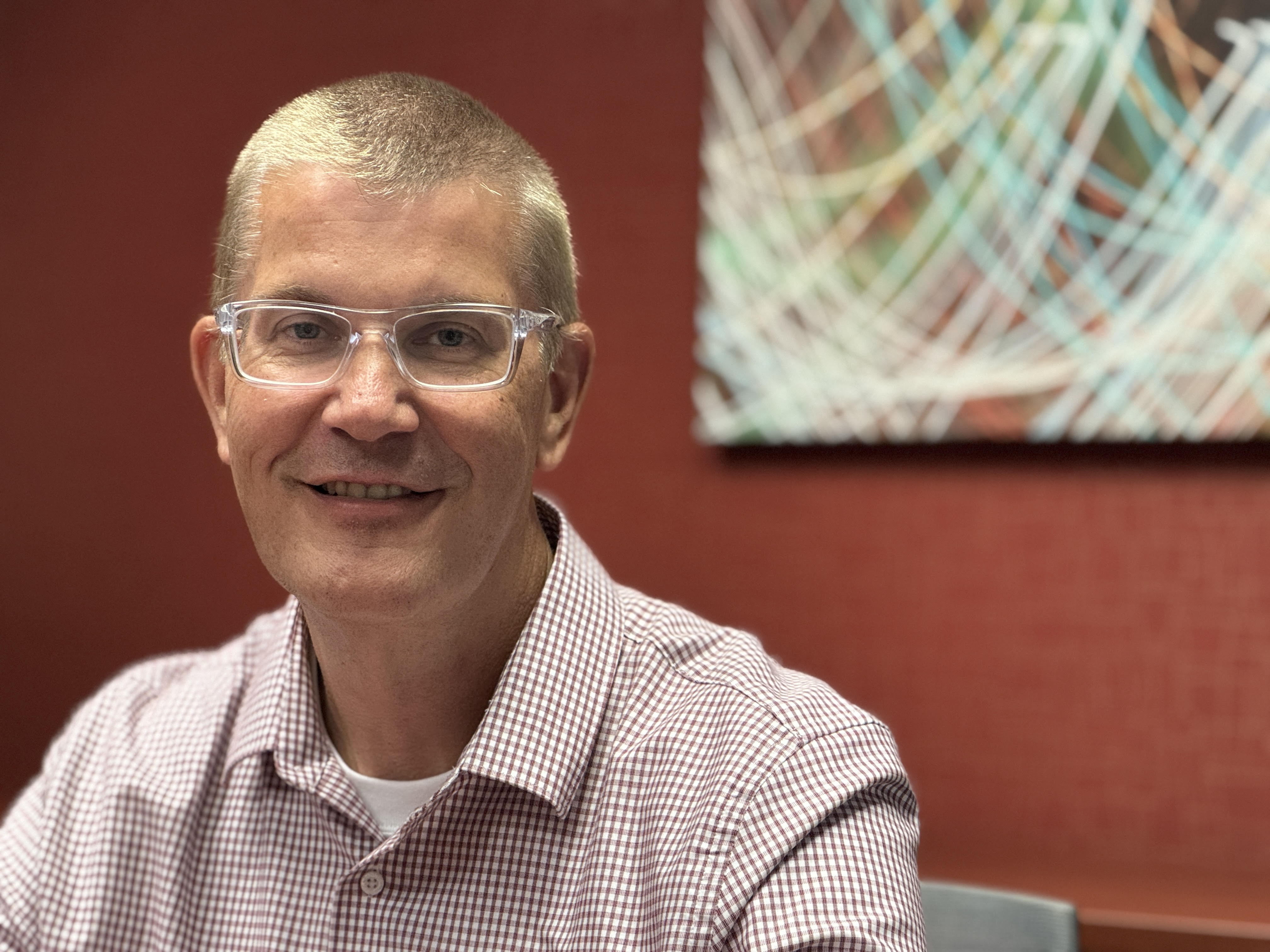 Professional portrait of Stan Jesionowski, AI consultant